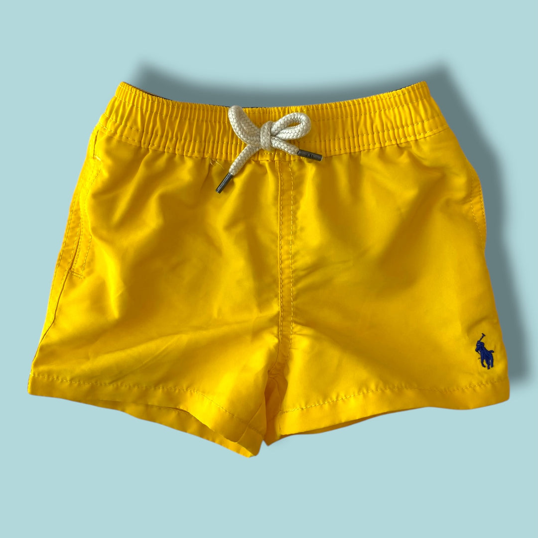 yellow Ralph Lauren swim shorts, 3-6m